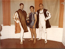 Photograph of Bill Beardemphl (right), his lifelong partner Johnny DeLeon (center), and an unidentified friend, circa 1960s. This photo may have been taken at an Imperial Court event, given the Renaissance costumes worn by the men. 