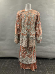 Peach sequined tunic and skirt with crane motif 