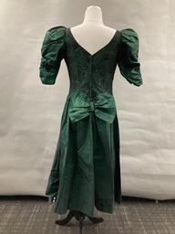 Green lace gown worn by Finocchio's performers. This item is undated.