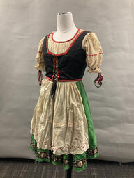Green dirndl dress worn by Finocchio's performers. This item is undated. 
