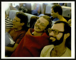 Chorus members on plane during their 1981 National Tour. Pictured in this photograph: John Kanke, Don Leighton, Ron O'Conner, Dave Goldman (Back).