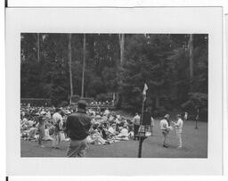 A crowd of people at an outdoor event, from the same roll of film as the Vanguard Street Sweep photographs.