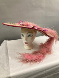 Pink feathered hat worn by Finocchio's performers. This item is undated. 
