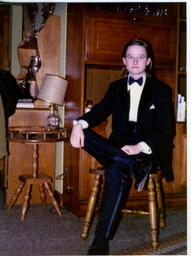 Lou Sullivan in his early twenties, dressed in a tuxedo for a Milwaukee drag ball.