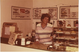 D'Anne behind the counter at Cafe Denise