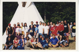 A group photo of Bay Area American Indian Two Spirits (BAAITS) members at an event or retreat. 